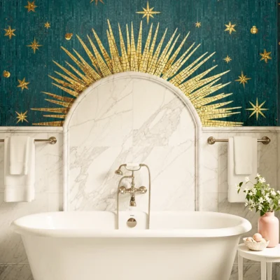 Mosaic mural of golden sunrays and swirling clouds in an arched niche, blending celestial elegance with refined architectural detail.