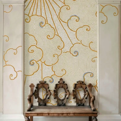 Mosaic mural of golden sunrays and swirling clouds in an arched niche, blending celestial elegance with refined architectural detail.