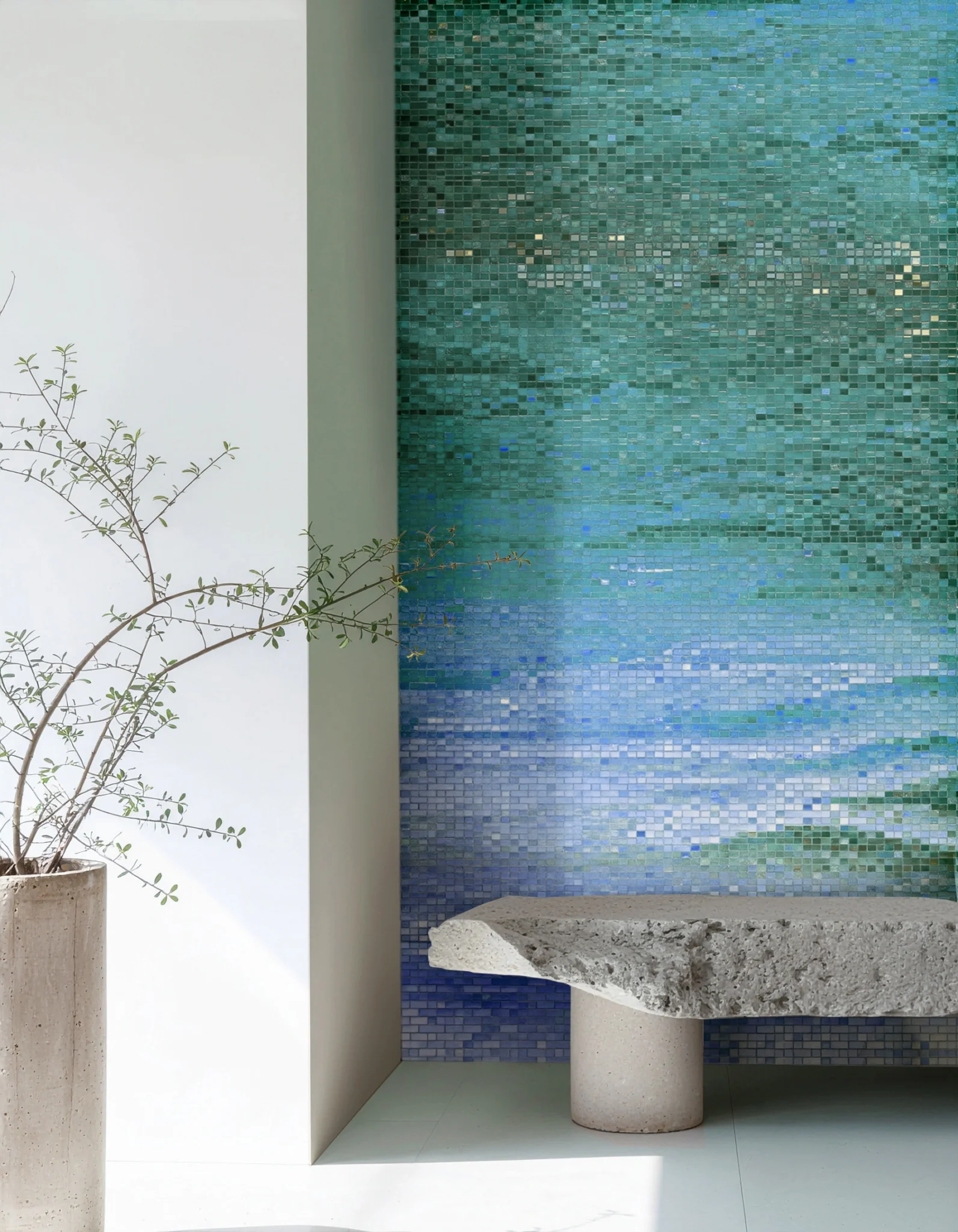 Gradient mosaic wall with aqua and blue tones reflecting soft ocean movement, ideal for bright modern bathrooms and living spaces.