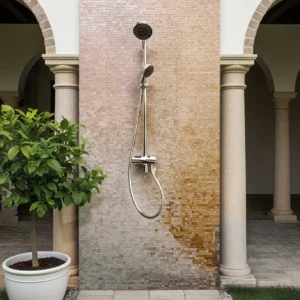 Beige and gold mosaic wall inspired by sandstone textures, bringing natural warmth and minimal elegance to an outdoor shower area.
