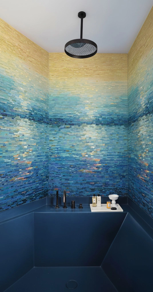 Golden and ocean blue mosaic tiles forming a sunset reflection pattern, perfect for luxury spa and bathroom interiors.