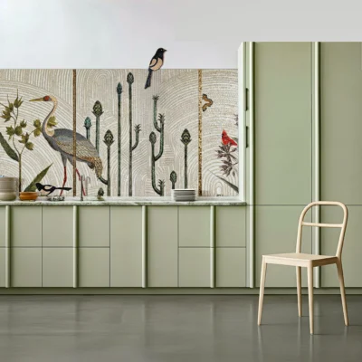 Kitchen mosaic backsplash with a crane, plants, birds and butterflies in soft neutral tones, paired with sage green cabinets for a calm modern look.