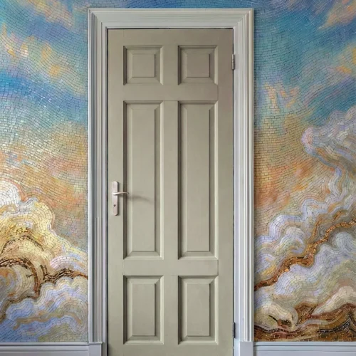 Artistic ombre mosaic wall in blue, beige, and gold tones surrounding a neutral interior door with flowing, wave-inspired tile design.
