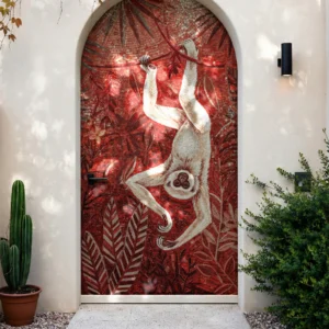 Monkey mosaic wall art with tropical leaves in rich red tones, displayed on an arched doorway for a bold and artistic statement.