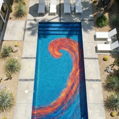 Abstract fiery wave pool mosaic with red and orange swirl on a deep blue background