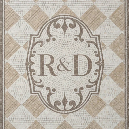 Monogram mosaic tile with R&D initials, crest design, and beige diamond patterned background.
