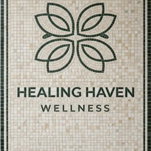 Mosaic tile panel with green lotus emblem and “Healing Haven Wellness” text on ivory background.