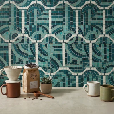 Geometric blue and teal mosaic wall design with Art Deco-inspired patterns, ideal for luxury kitchens and modern interiors.