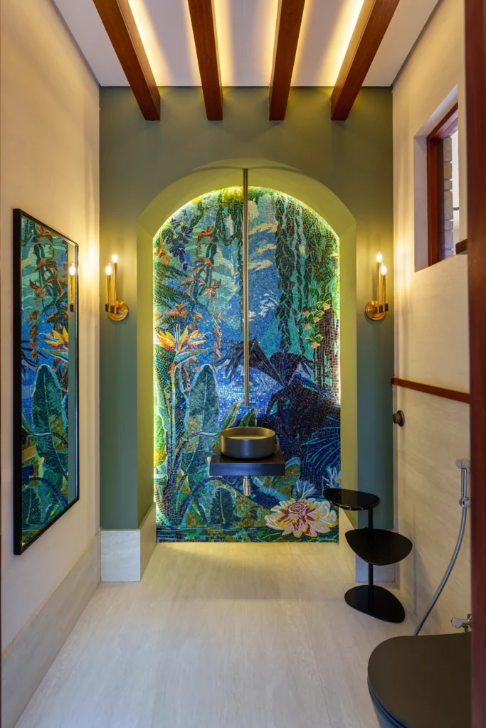 Luxury tropical bathroom mosaic wall with lush botanical artwork in blue and green tones, creating a serene spa-inspired interior.