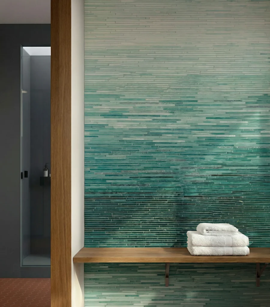 Ombre glass mosaic wall tile with layered aqua and deep teal tones in our Chromatique Mosaic Tile Collection