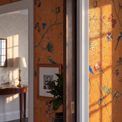 Handcrafted saffron-orange mosaic wall featuring flowering vines, colorful birds, and botanical motifs in an artistic luxury interior.