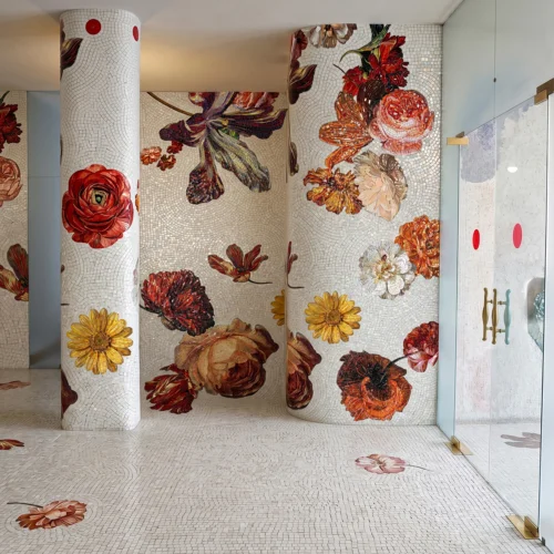Handcrafted floral mosaic mural featuring oversized blooms in amethyst, ruby, amber, and gold tones on a luminous ivory background.