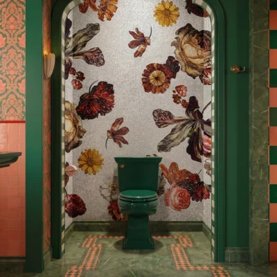 Handcrafted floral mosaic mural featuring amber, burgundy, and gold blossoms with intricate botanical details on an ivory background.