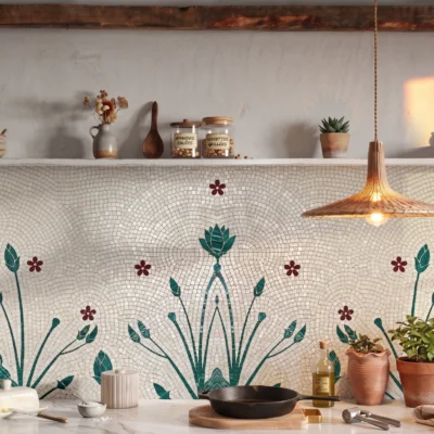 Handcrafted botanical mosaic backsplash featuring green foliage and russet floral accents on an ivory background with flowing mosaic patterns.