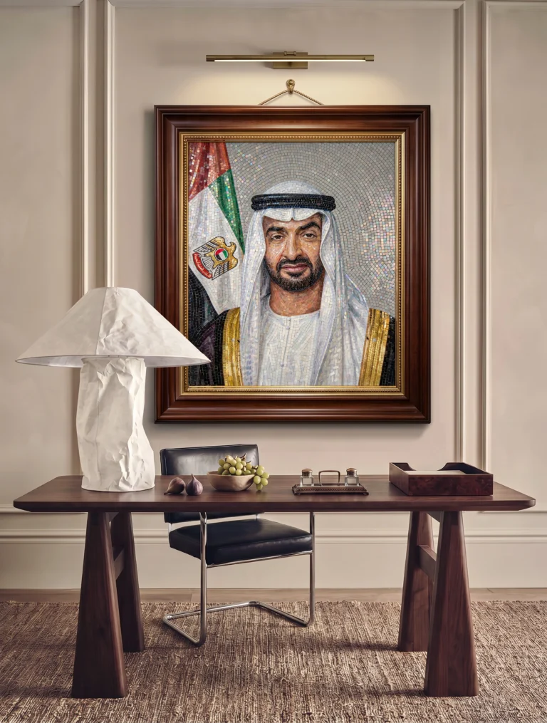 Handcrafted mosaic portrait of His Highness Sheikh Mohamed bin Zayed Al Nahyan with the UAE flag in a refined executive interior.