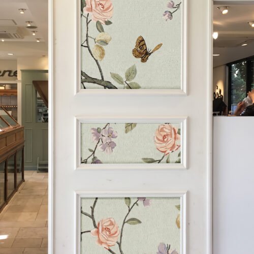 Handcrafted framed mosaic wall panels featuring blush roses, butterflies, and botanical branches in soft pastel tones for elegant interiors.