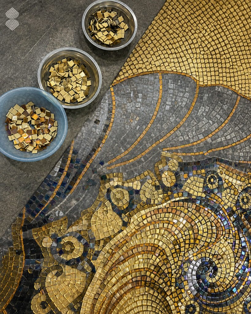 small bowls filled with extra gold tiles nearby.
