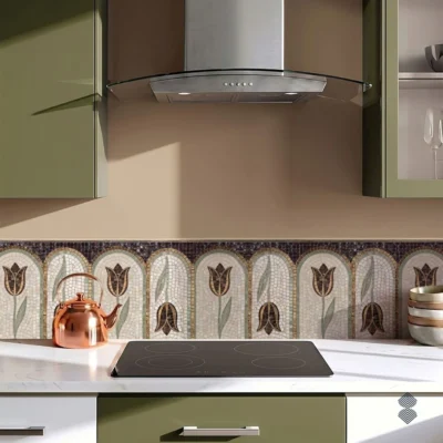 Handcrafted tulip mosaic kitchen backsplash featuring repeating arches, floral motifs, sage green, brown, and ivory tones.
