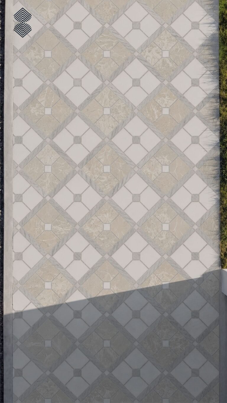 A diamond marble walkway mosaic in cream, beige and gray laid underfoot along a stone path.