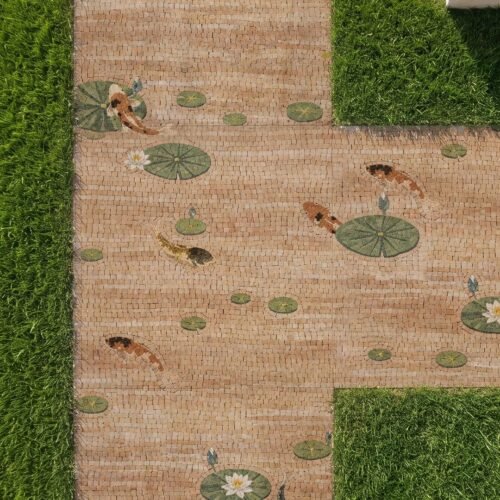 A koi pond walkway mosaic set into a garden path, showing koi fish swimming among lily pads and lotus blooms.