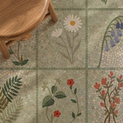 A botanical grid mosaic of flowers and leaves installed as a shower wall panel.