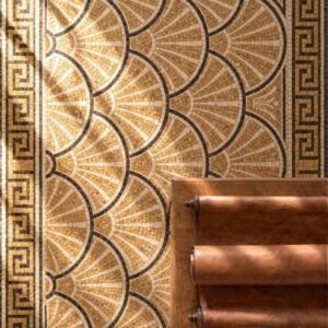 A roman fan mosaic floor panel with gold and cream scalloped shell patterns inside a Greek key border