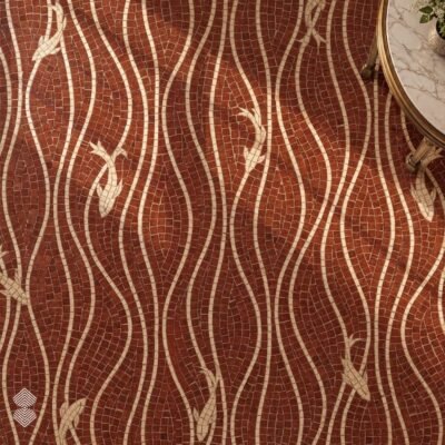 A roman wave fish mosaic floor in rust red stone with cream wave bands and swimming fish motifs